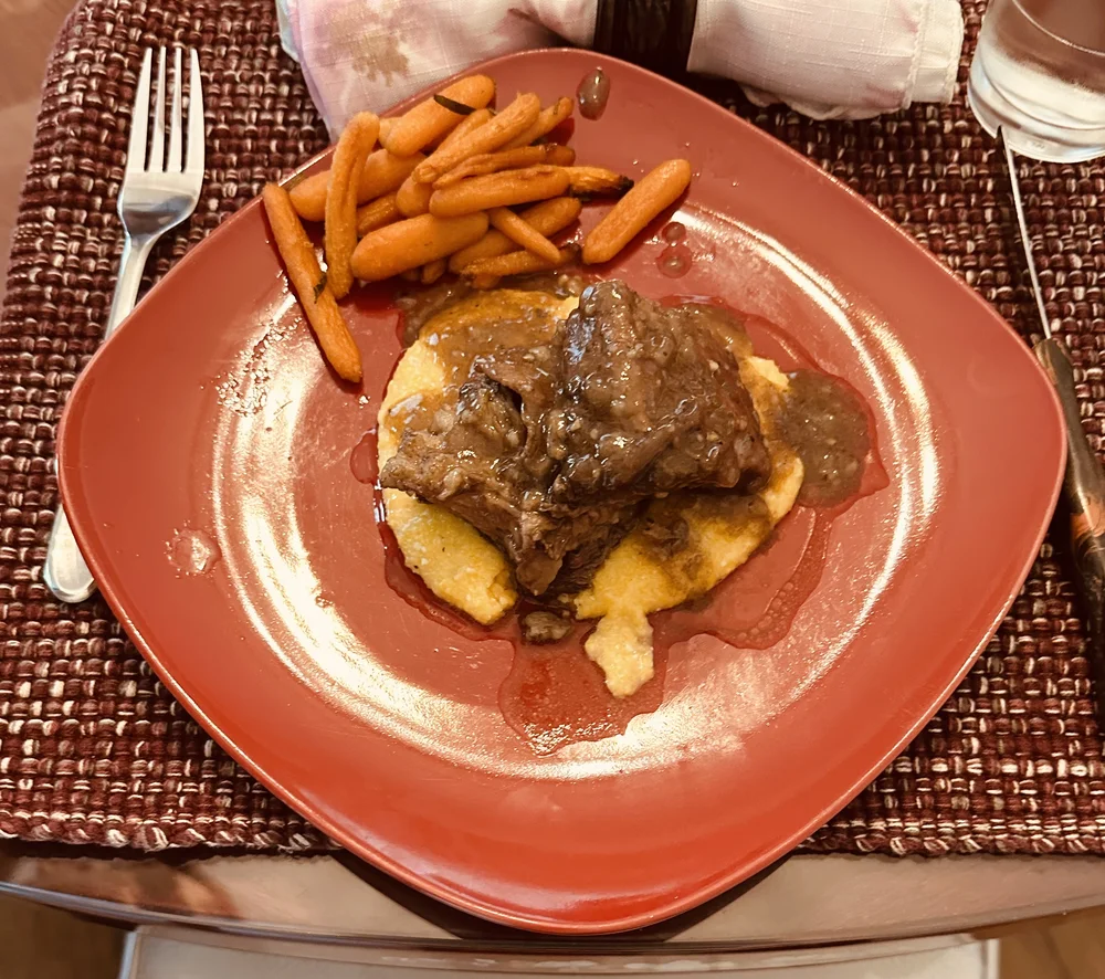 short ribs baby carrots and polenta parmesan