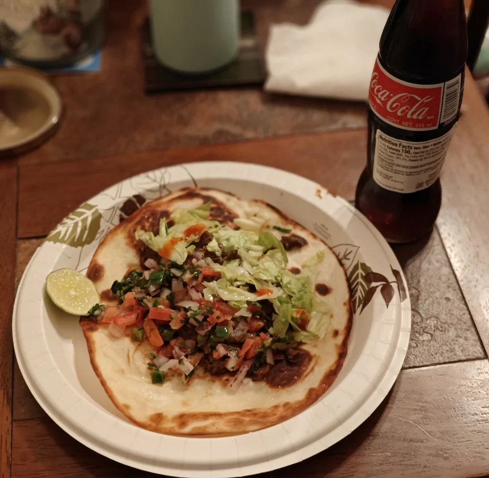 a taco and a mexican coke