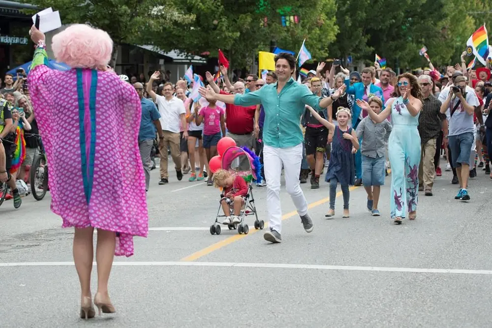 happy gay justin trudeu running towards love