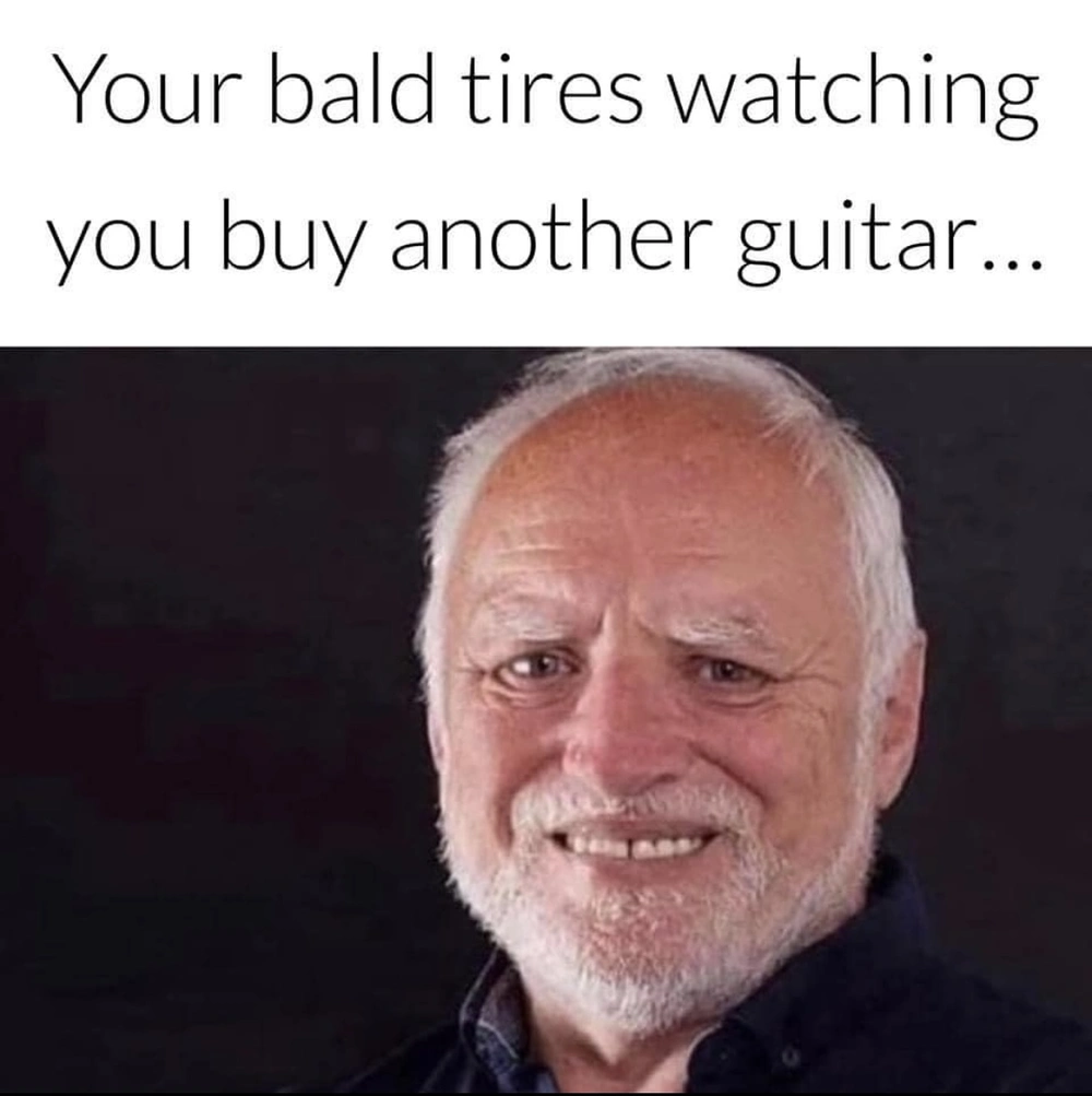 bald tires another guitar
