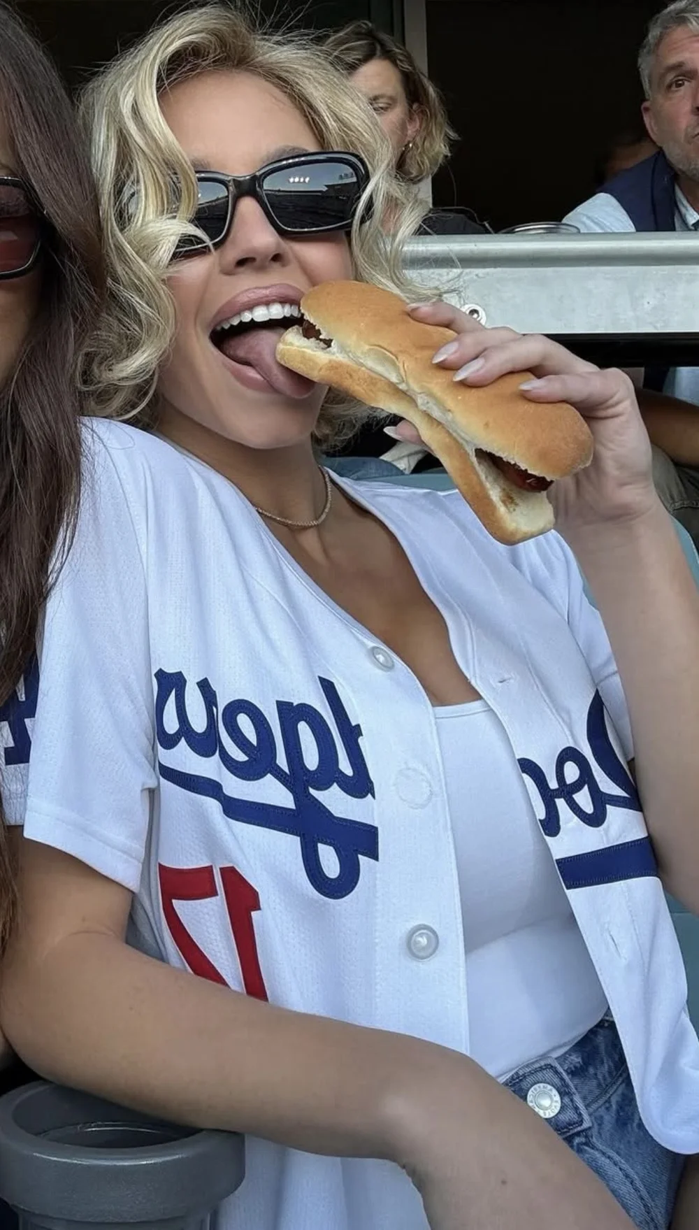 sweeney eats a hot dog